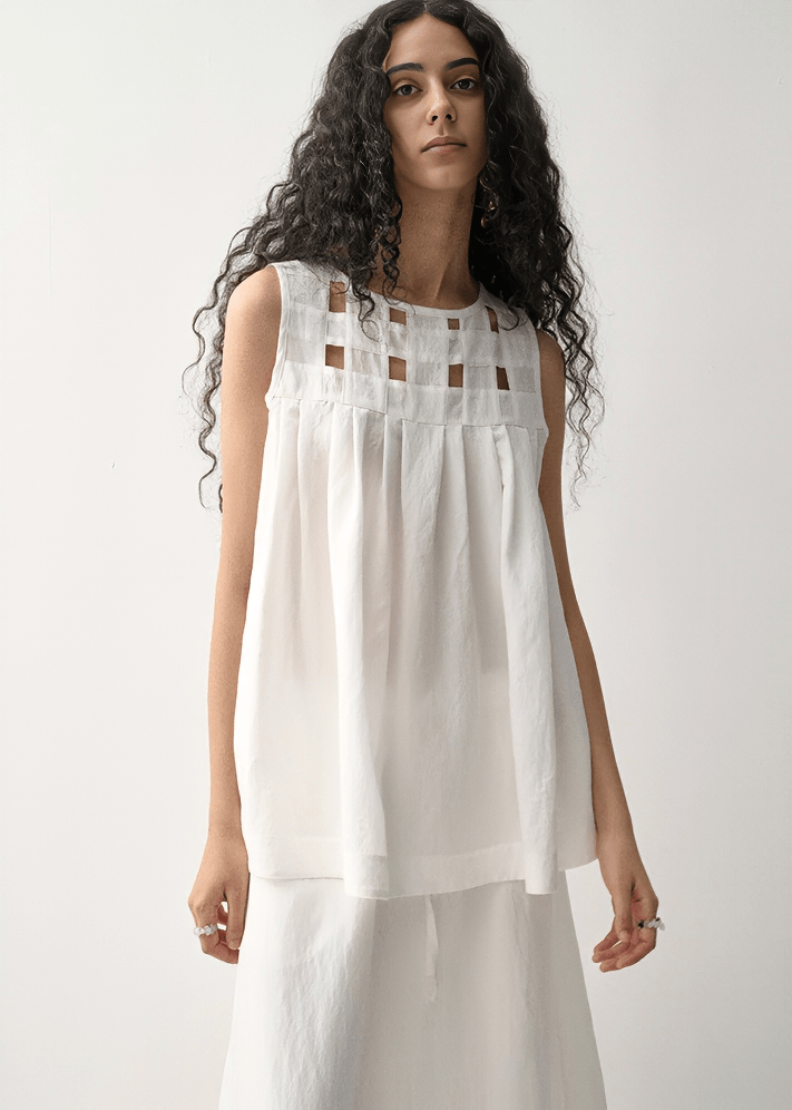 GEOMETRIC CUTOUT SLEEVELESS TUNIC - Vera Lumina
