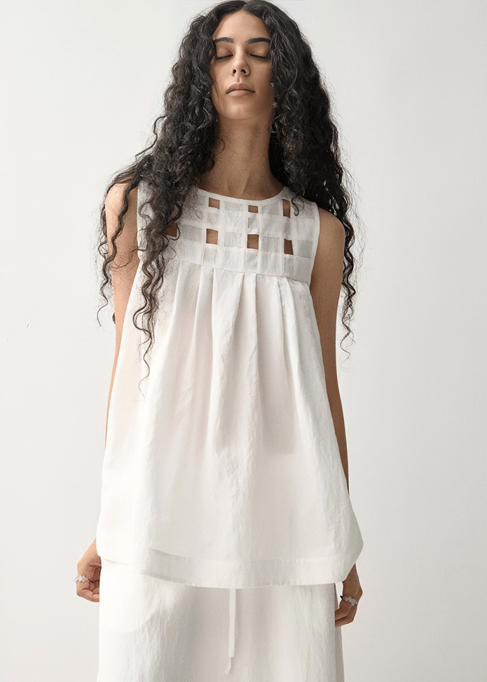 GEOMETRIC CUTOUT SLEEVELESS TUNIC - Vera Lumina