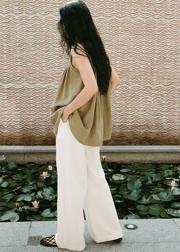 GEOMETRIC CUTOUT SLEEVELESS TUNIC - Vera Lumina