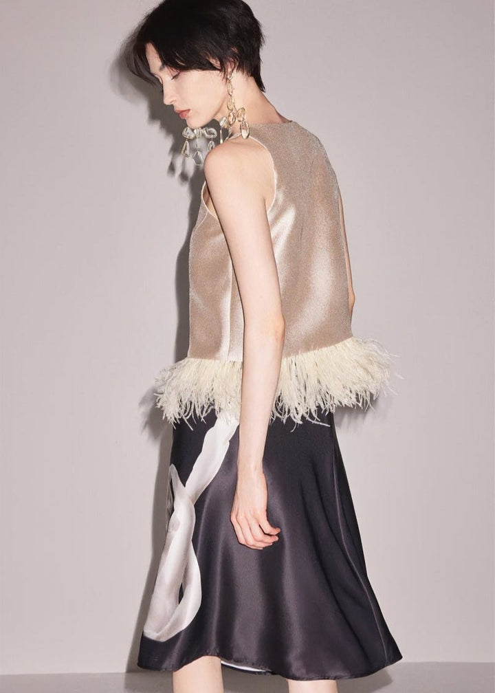oose matte gold sleeveless tops & skirt - Vera Lumina