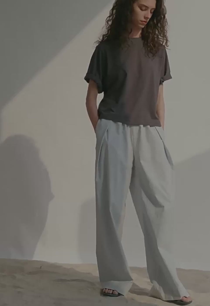 Pantalon large plissé de la jambe